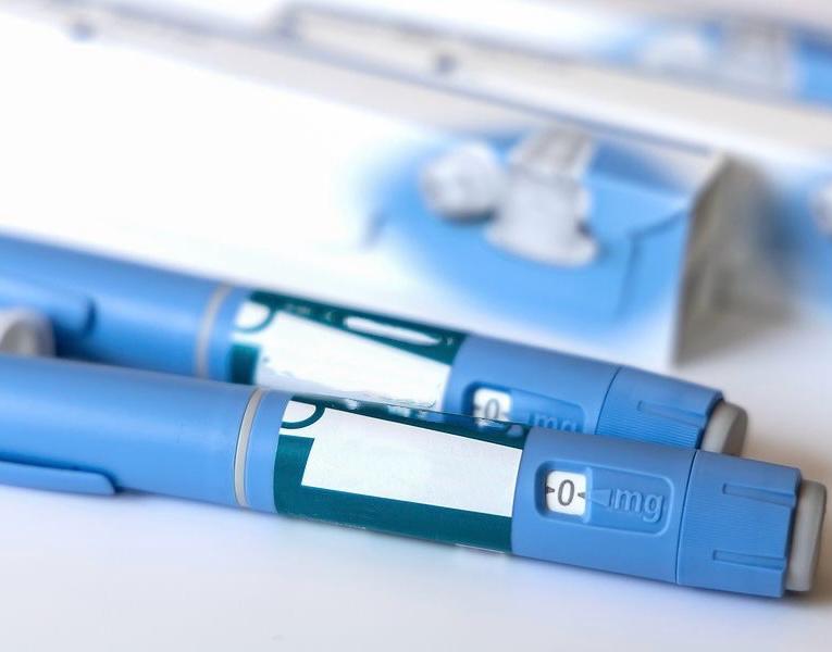 GLP-1 weight-loss medication pen on a clinical surface
